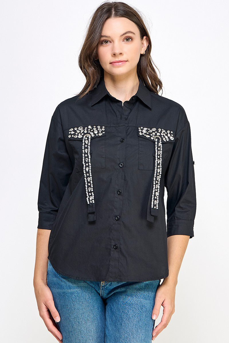 BLUSA CON PEDRERIA 3D EN BOLSILLOS
