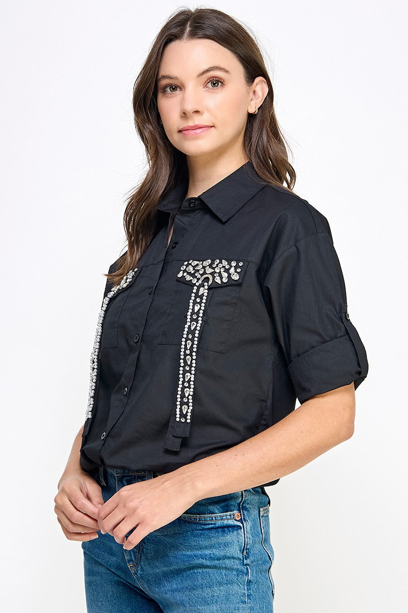 BLUSA CON PEDRERIA 3D EN BOLSILLOS