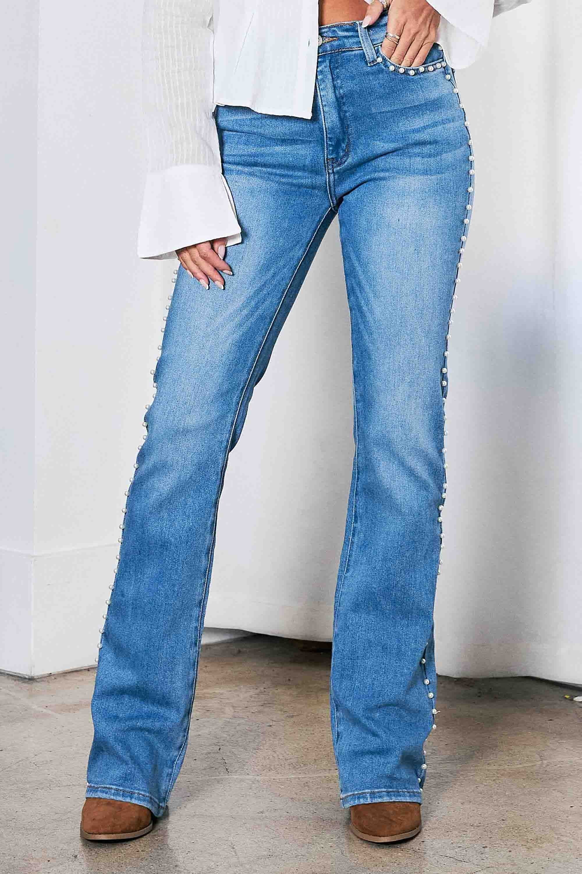 BOOTCUT JEANS CON APLICACIONES AL COSTADO